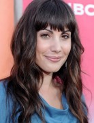 Carly Pope Long Wavy Hairstyles with Blunt Bangs