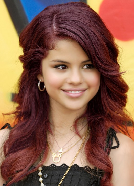 Selena Gomez Hairstyles: Red Long Curly Hairstyle
