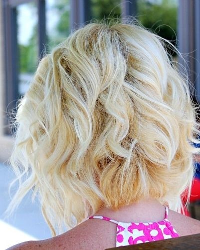 Angled Piecey Bob Haircut with soft curls